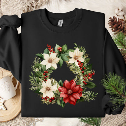 Black Gildan crewneck sweatshirt with a watercolor poinsettia wreath design in red, white, and green.
