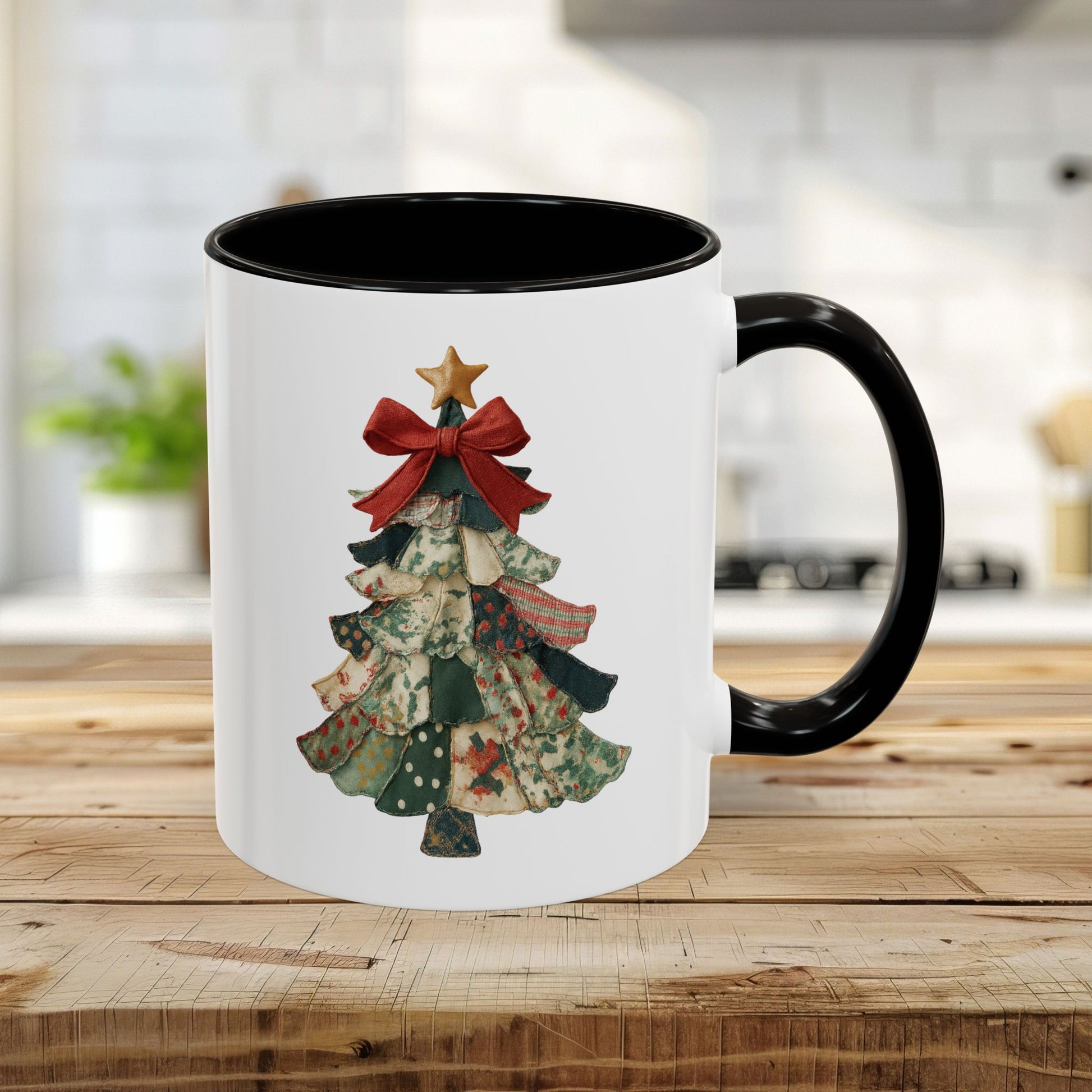 White ceramic mug with black handle and interior, featuring a patchwork Christmas tree design.