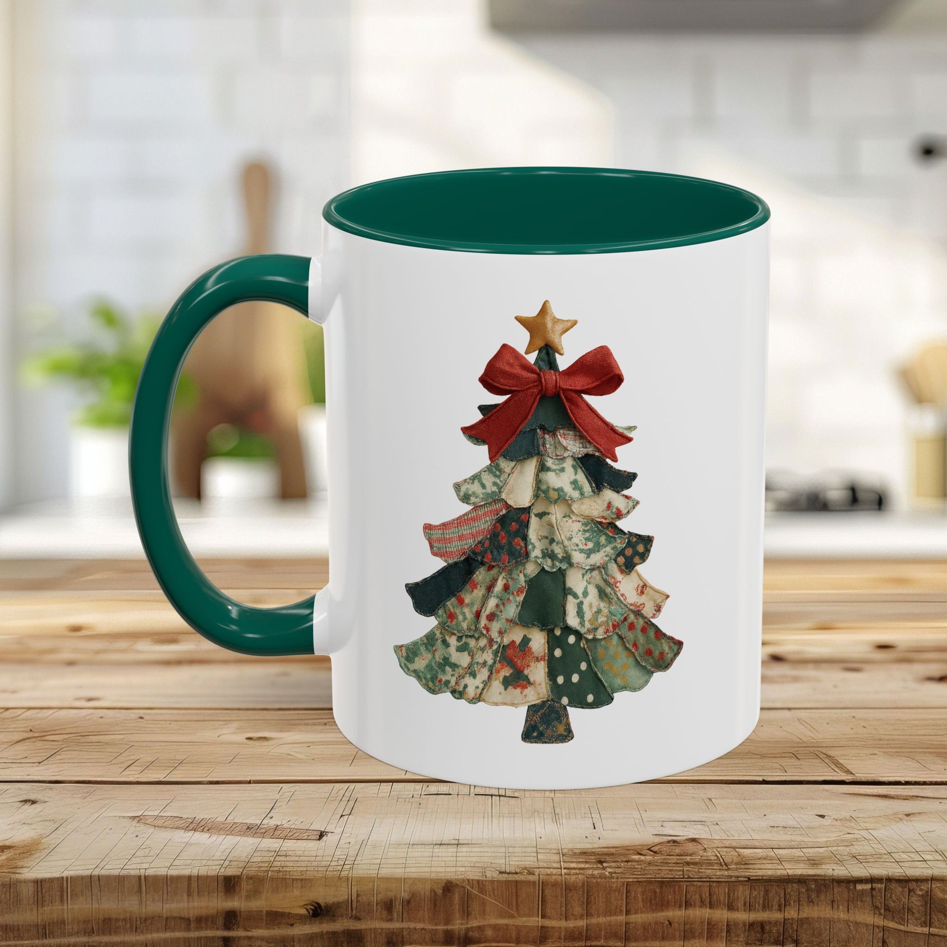 White ceramic mug with green interior/handle, featuring a patchwork Christmas tree design.