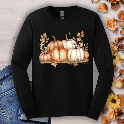 Black Gildan 2400 long sleeve tee with watercolor orange and white pumpkins, surrounded by fall leaves.