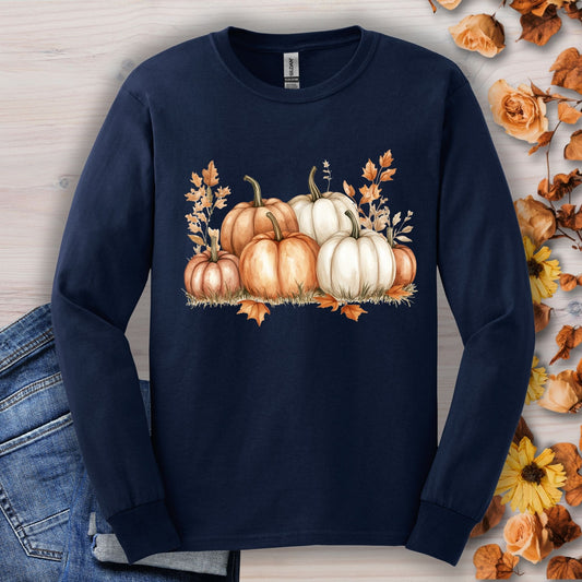 Navy long sleeve tee with watercolor orange and white pumpkins, fall leaves, and jeans.
