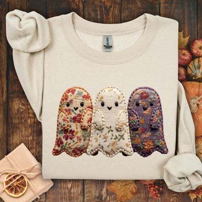 Sand Gildan sweatshirt with three embroidered-style ghosts made from vintage floral fabrics.