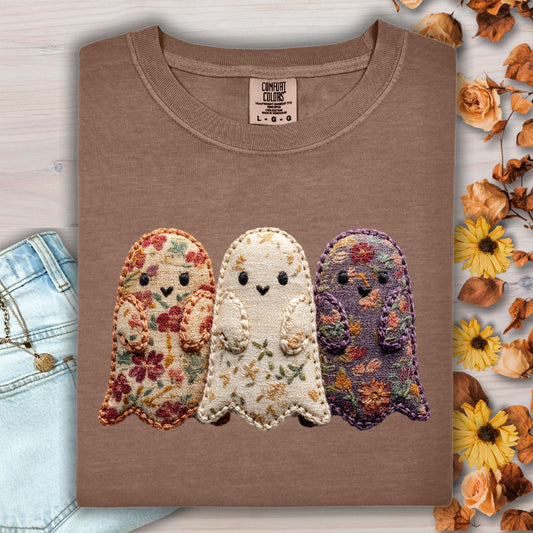 Espresso Comfort Colors tee with three embroidered floral fabric ghosts, light wash jeans, and fall leaves.