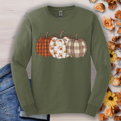Military Green long sleeve tee with 3 quilted pumpkins: plaid, floral, and checkered designs.
