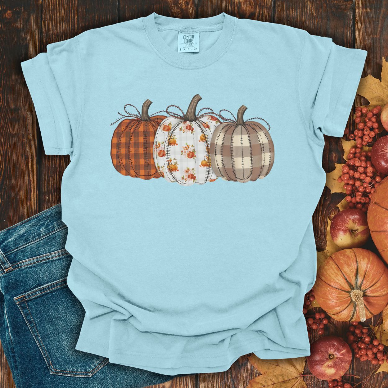 Chambray Quilted Pumpkins T-Shirt with plaid, gingham, and leaf patterned pumpkins.