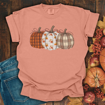 Terracotta Quilted Pumpkins T-Shirt with plaid, gingham, and leaf patterned pumpkins.