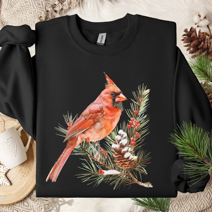 Black S sweatshirt with a red cardinal on a snowy evergreen branch design.