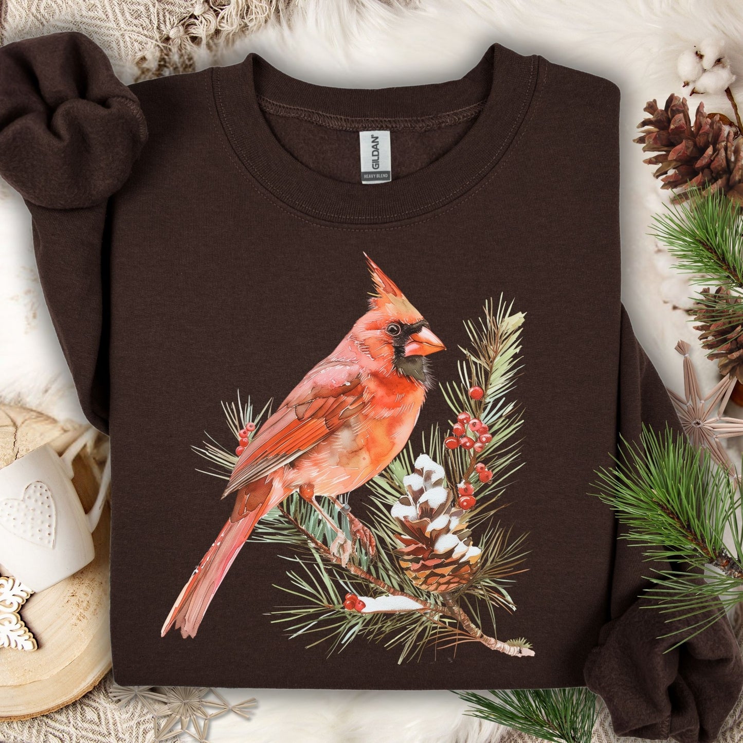 Dark Chocolate sweatshirt with a red cardinal on a snowy evergreen branch design.