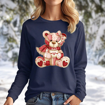 Navy long-sleeve tee with a patchwork country teddy bear holding a steaming cup, in soft beiges, reds, and pinks.