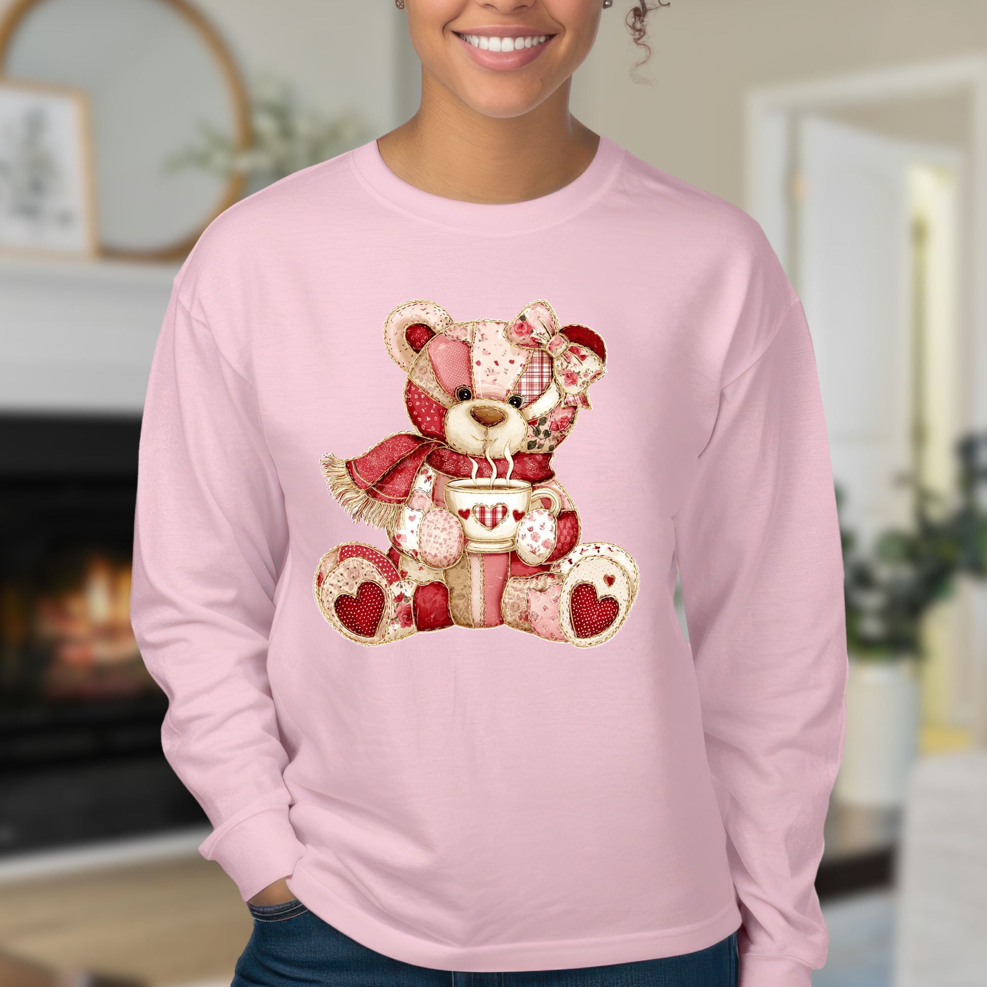 Pink long-sleeve tee with a patchwork country teddy bear holding hot chocolate.