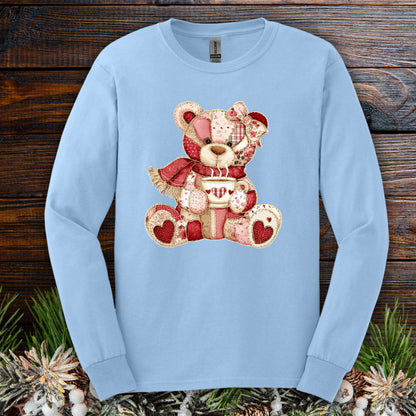 Light blue long-sleeve tee with a patchwork teddy bear holding hot chocolate, S size.
