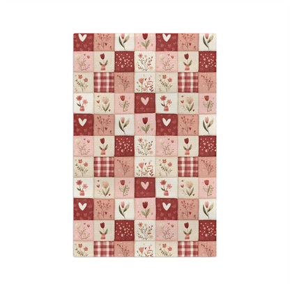 Red & pink patchwork microfiber tea towel with hearts, florals, and gingham checks.