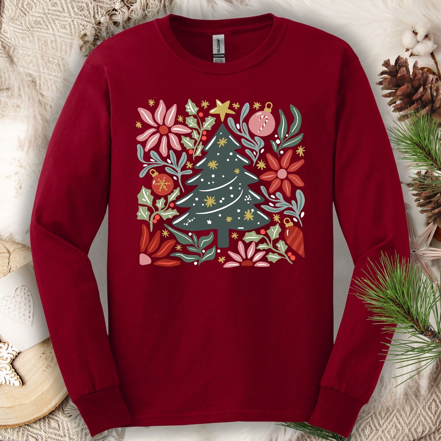 Cardinal Red Gildan Softstyle long sleeve tee with a retro watercolor Christmas tree and floral design.