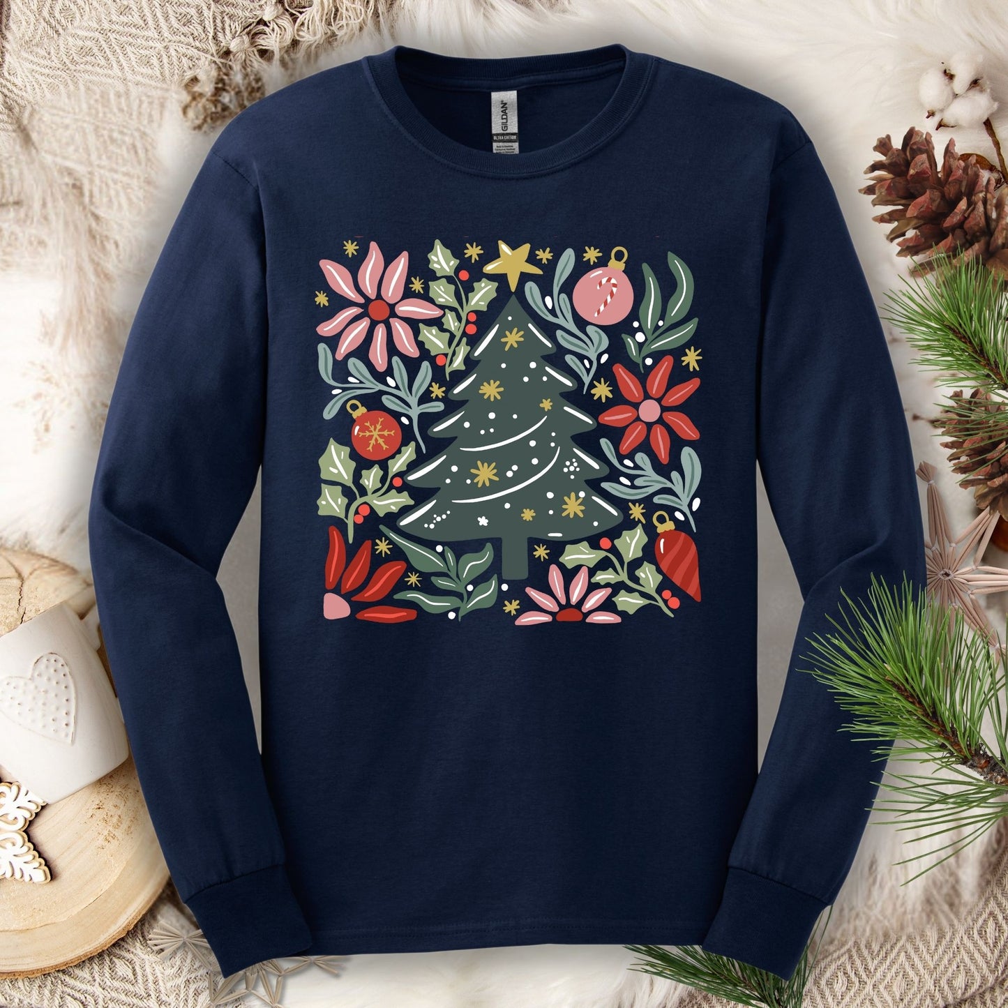 Navy Gildan long sleeve tee with a retro watercolor Christmas tree and floral design.
