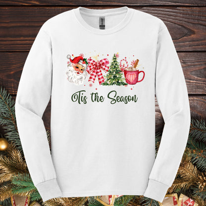 White Gildan long sleeve tee with retro Santa, tree, ribbon, cocoa, and "'Tis the Season" text.