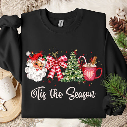 Black Gildan sweatshirt with retro 1950s Santa, plaid bow, Christmas tree, cocoa mug, and "'Tis the Season" text.