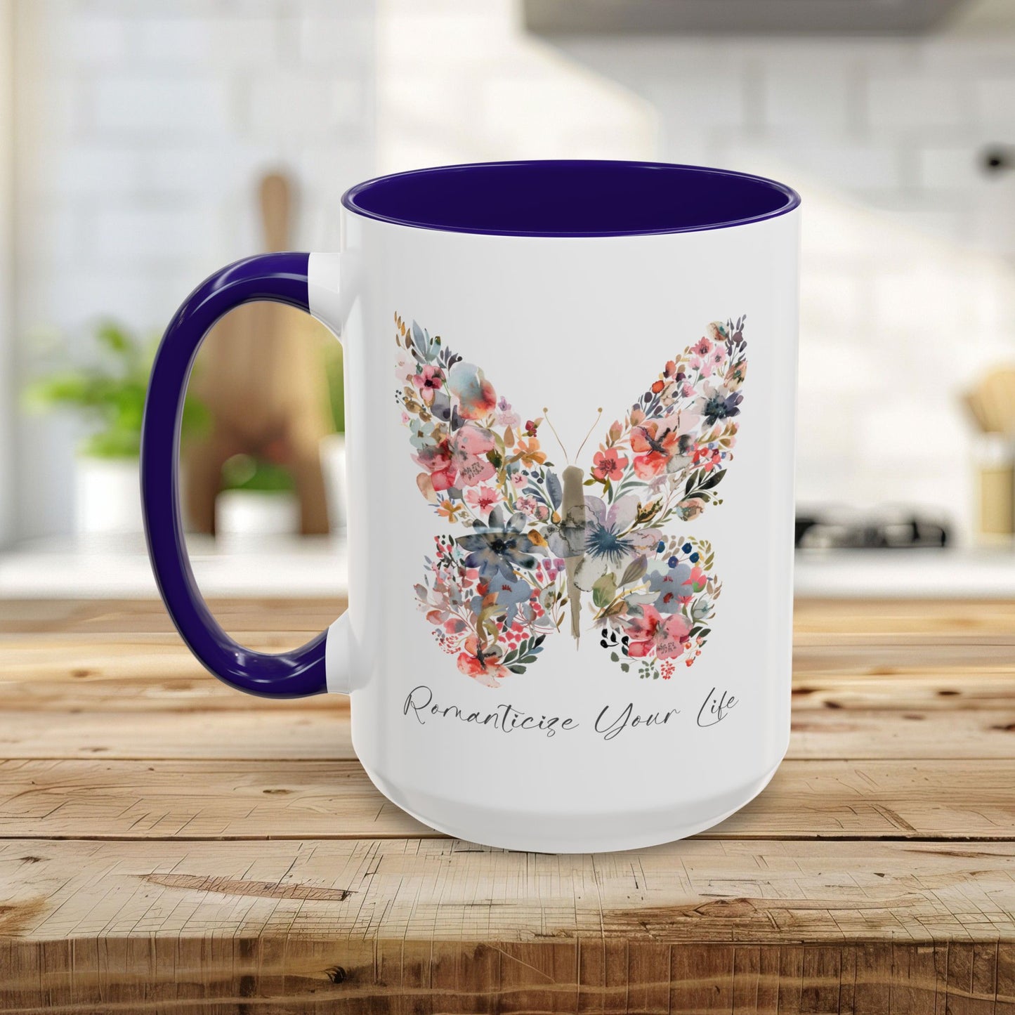 White ceramic mug with a purple handle and interior, featuring a watercolor floral butterfly and "Romanticize Your Life" text.