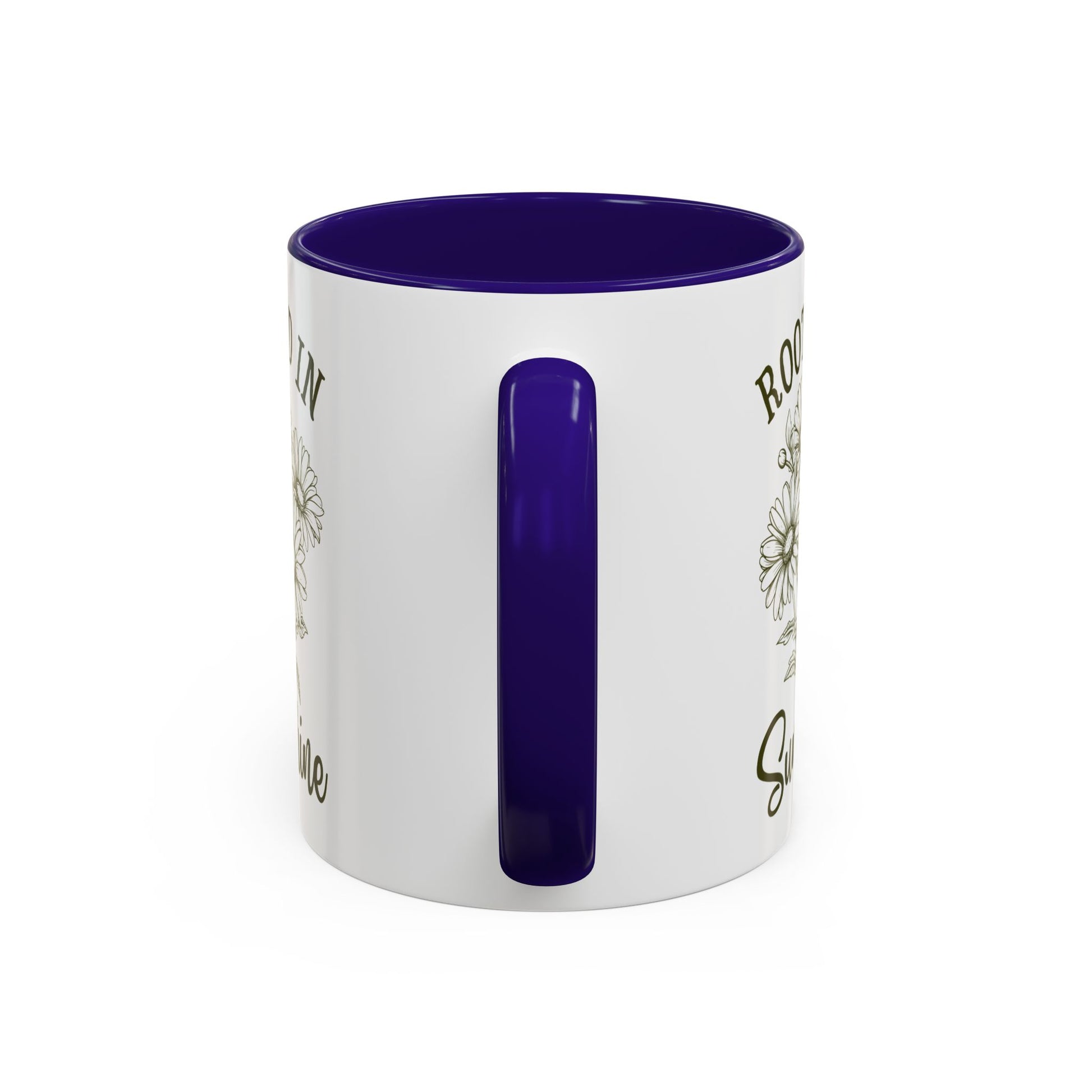 White ceramic mug with "Rooted in Sunshine" text, hand-drawn daisies, and a vibrant purple interior and handle.