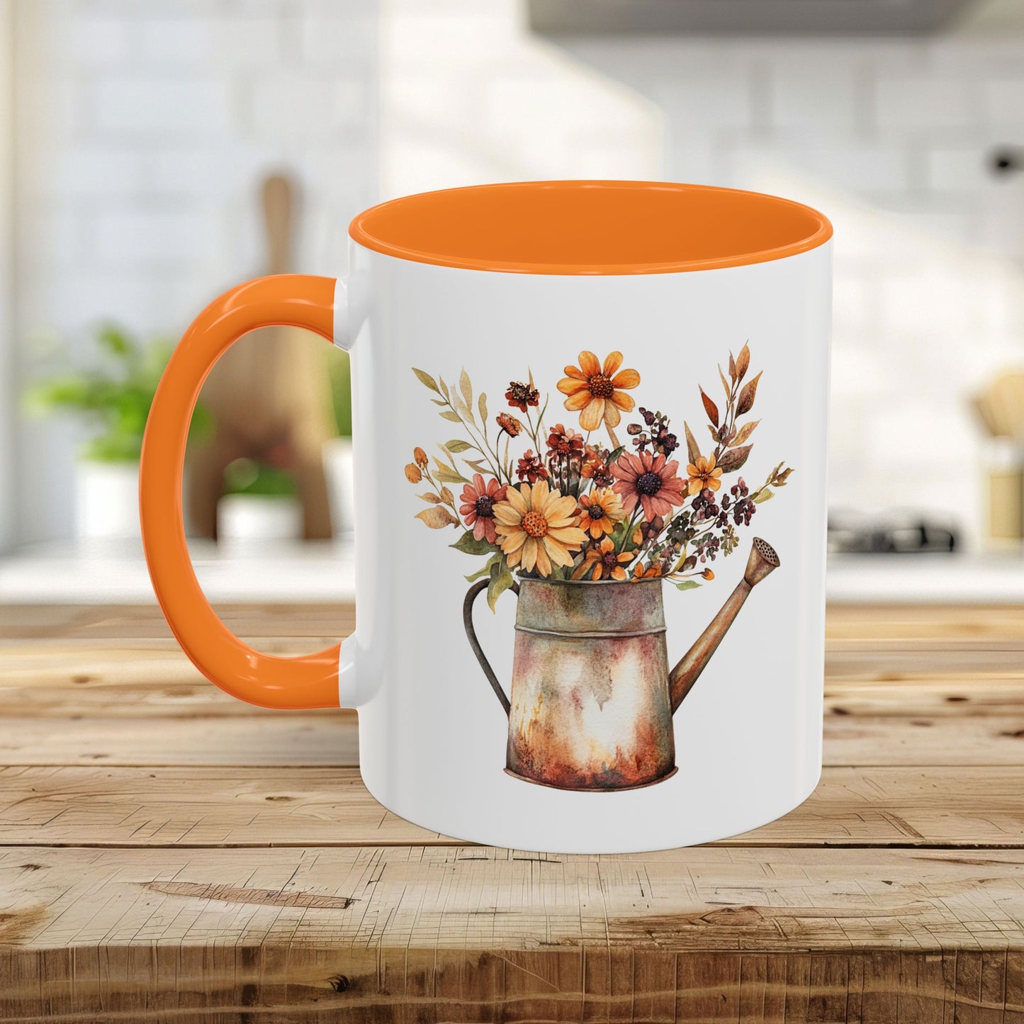 Ceramic mug with orange interior/handle, featuring a watercolor rustic watering can overflowing with autumn florals.