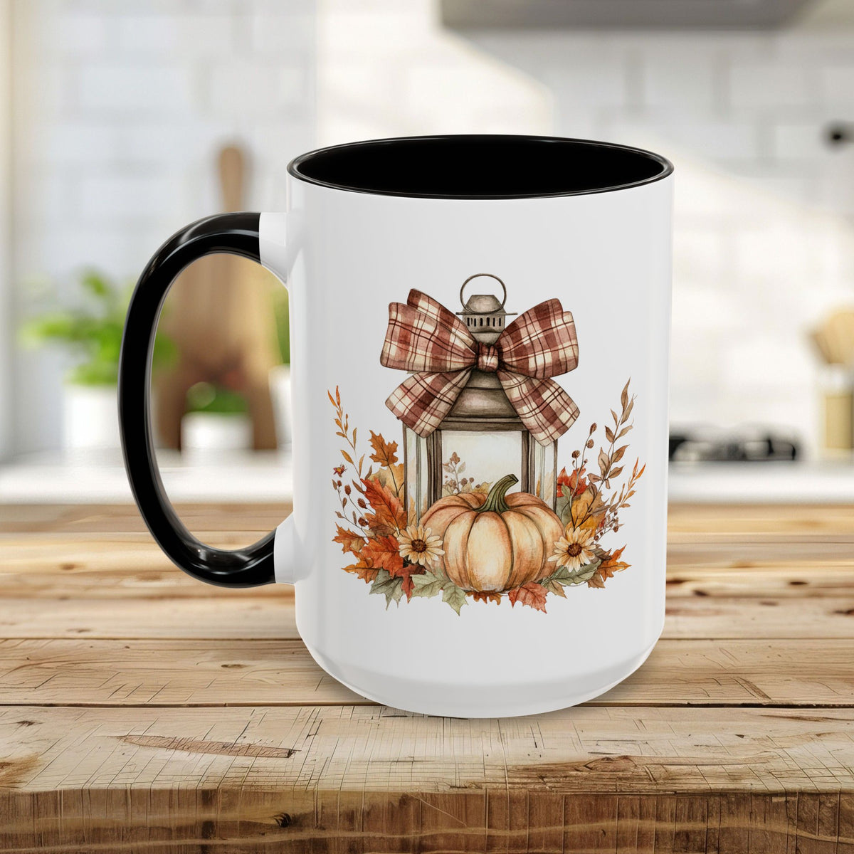 White ceramic mug with black handle and interior, featuring a rustic lantern, plaid bow, and autumn foliage design.
