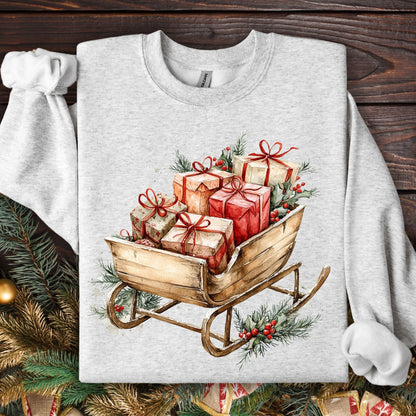 Ash Gildan fleece sweatshirt with a rustic watercolor sleigh full of Christmas gifts and evergreens.