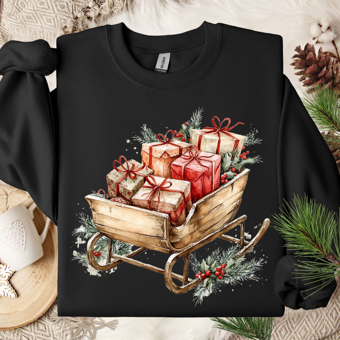 Black Gildan fleece sweatshirt with a rustic watercolor sleigh full of Christmas gifts and evergreens.