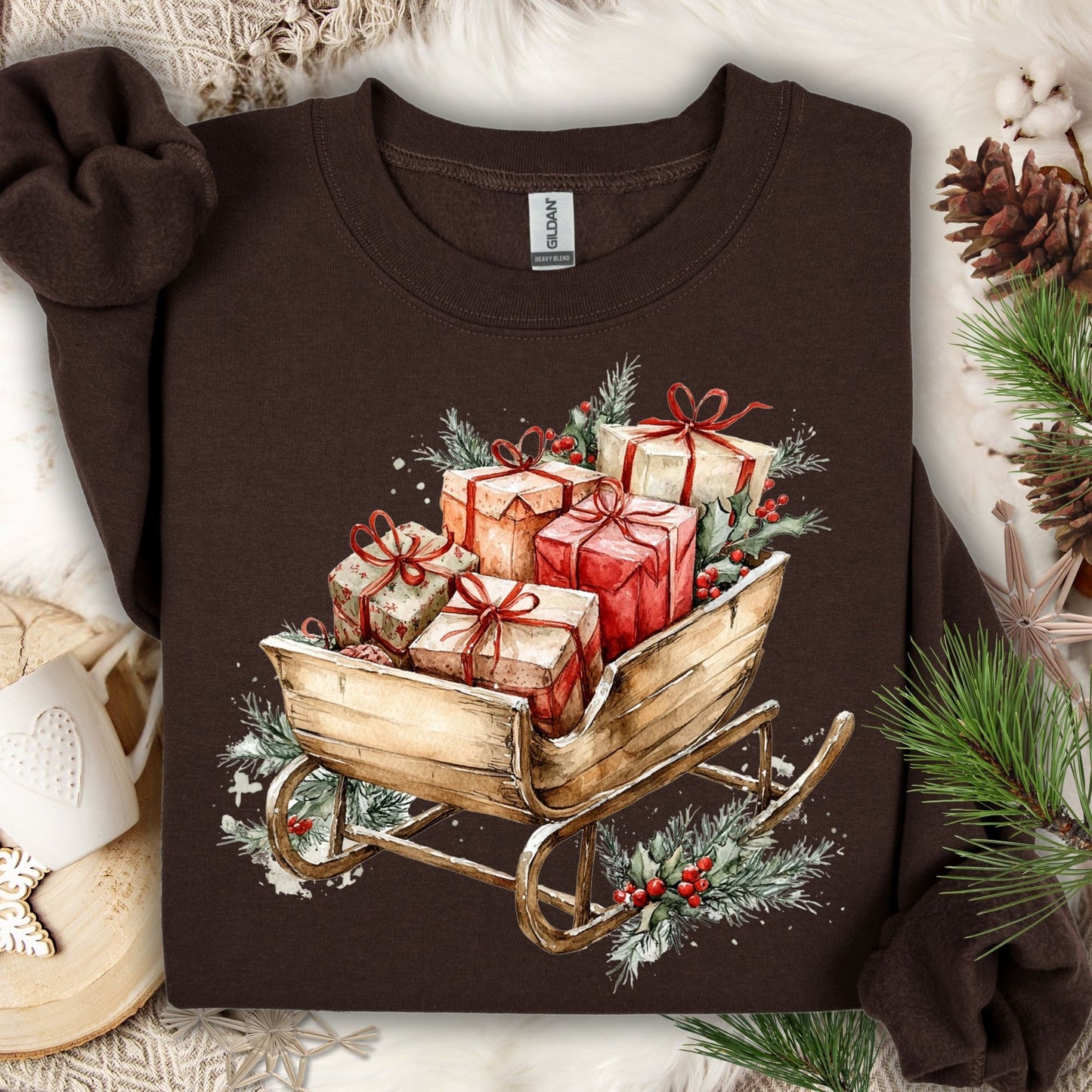 Dark chocolate Gildan fleece sweatshirt with a rustic watercolor sleigh overflowing with Christmas gifts.