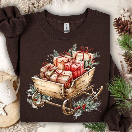 Dark chocolate Gildan fleece sweatshirt with a rustic watercolor sleigh overflowing with Christmas gifts.