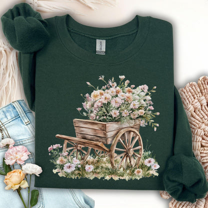 Forest Green sweatshirt with a watercolor illustration of a rustic wooden wagon overflowing with pink and white carnations.