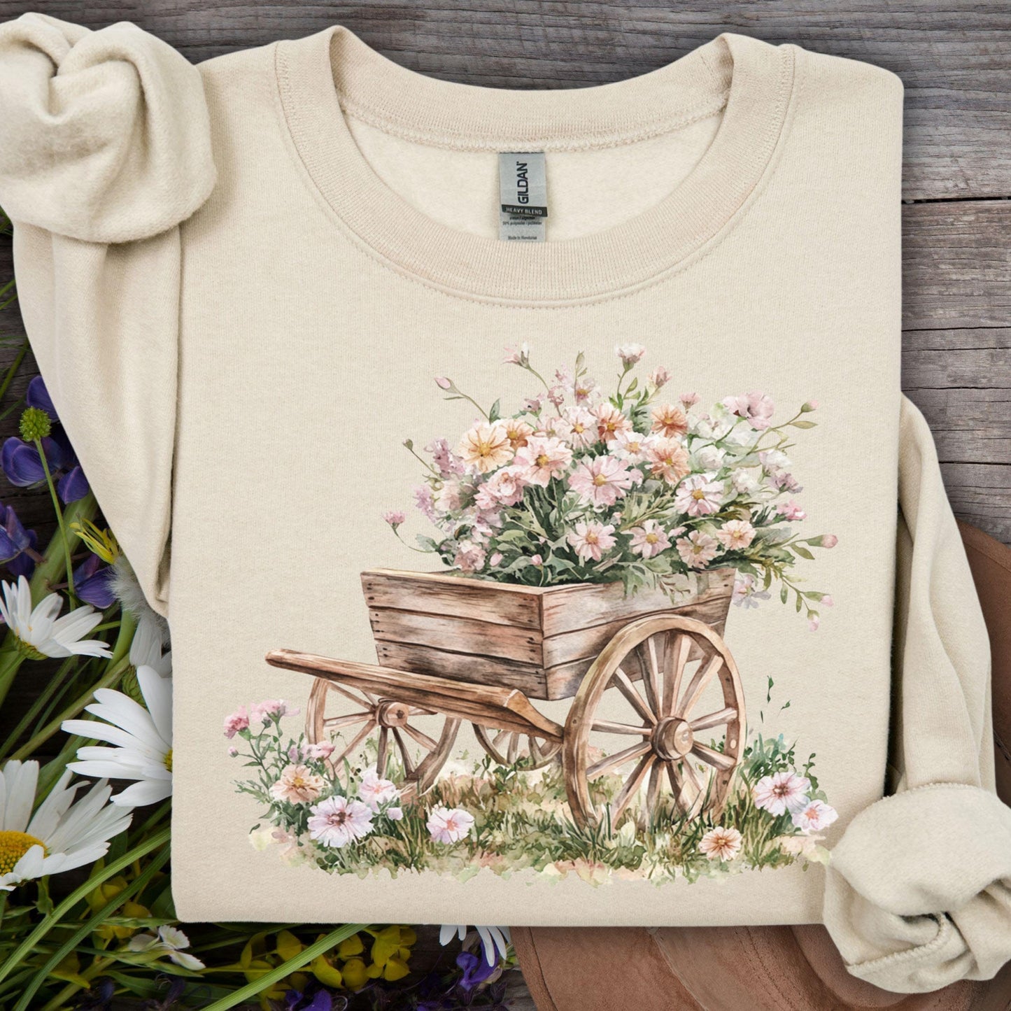 Sand sweatshirt with watercolor rustic wagon overflowing with pink carnations.