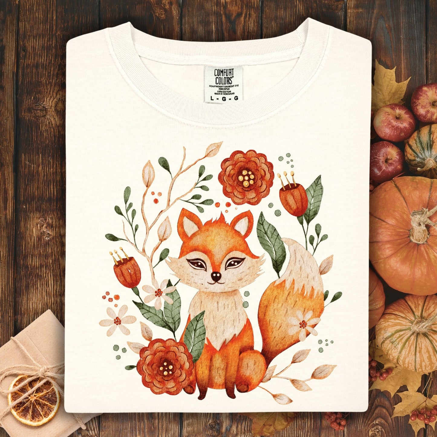 Ivory Comfort Colors tee with a rustic folk art fox and floral design.