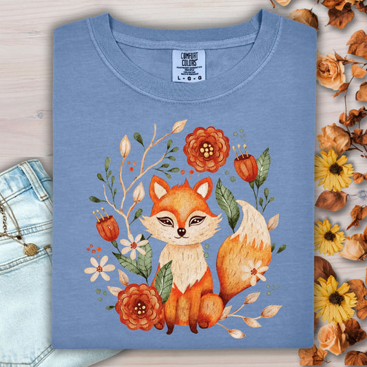 Blue Jean Rustic Folk Art Fox Tee, folded, with a watercolor fox and floral design.