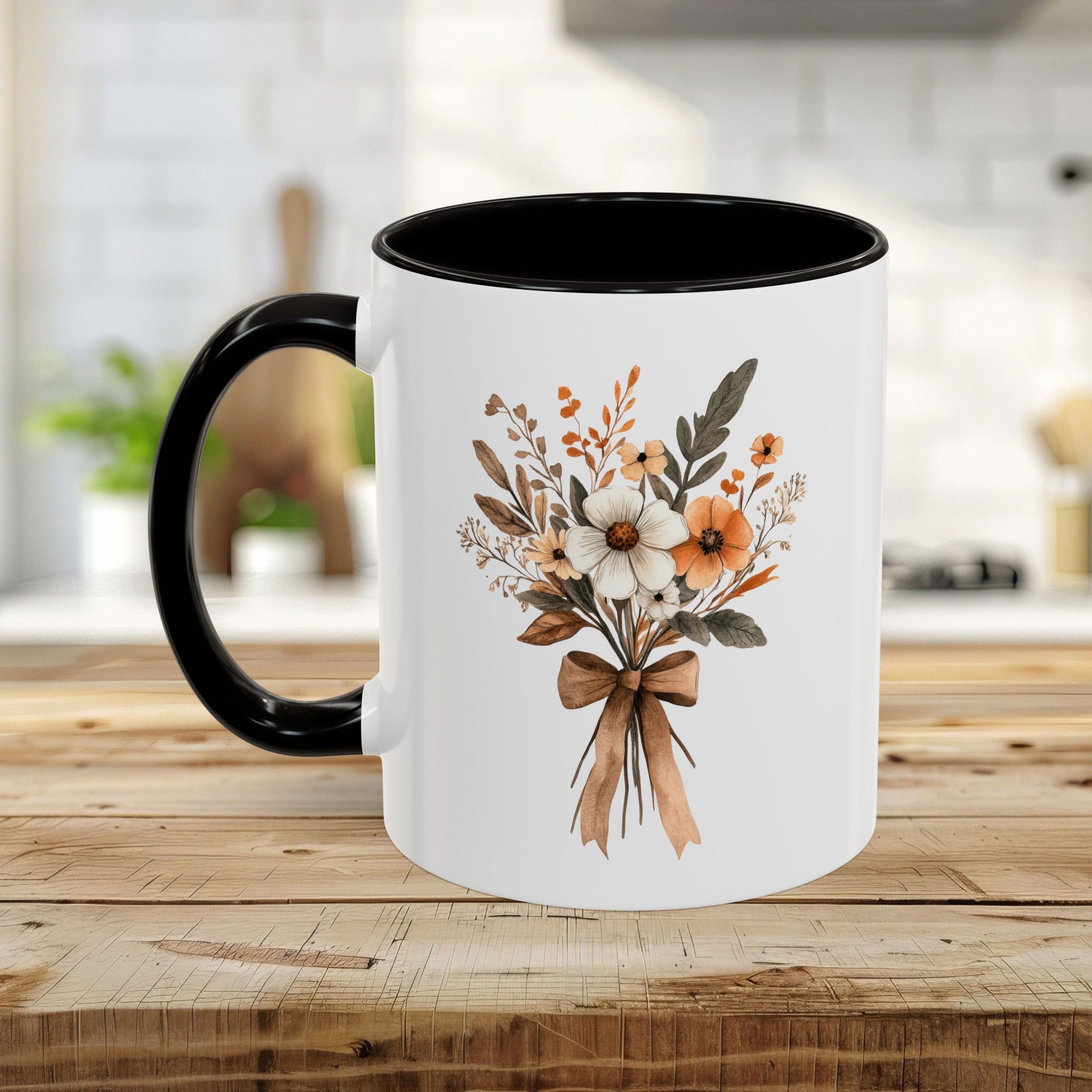 White ceramic mug with black handle and interior, featuring a sepia and cream floral bouquet design.