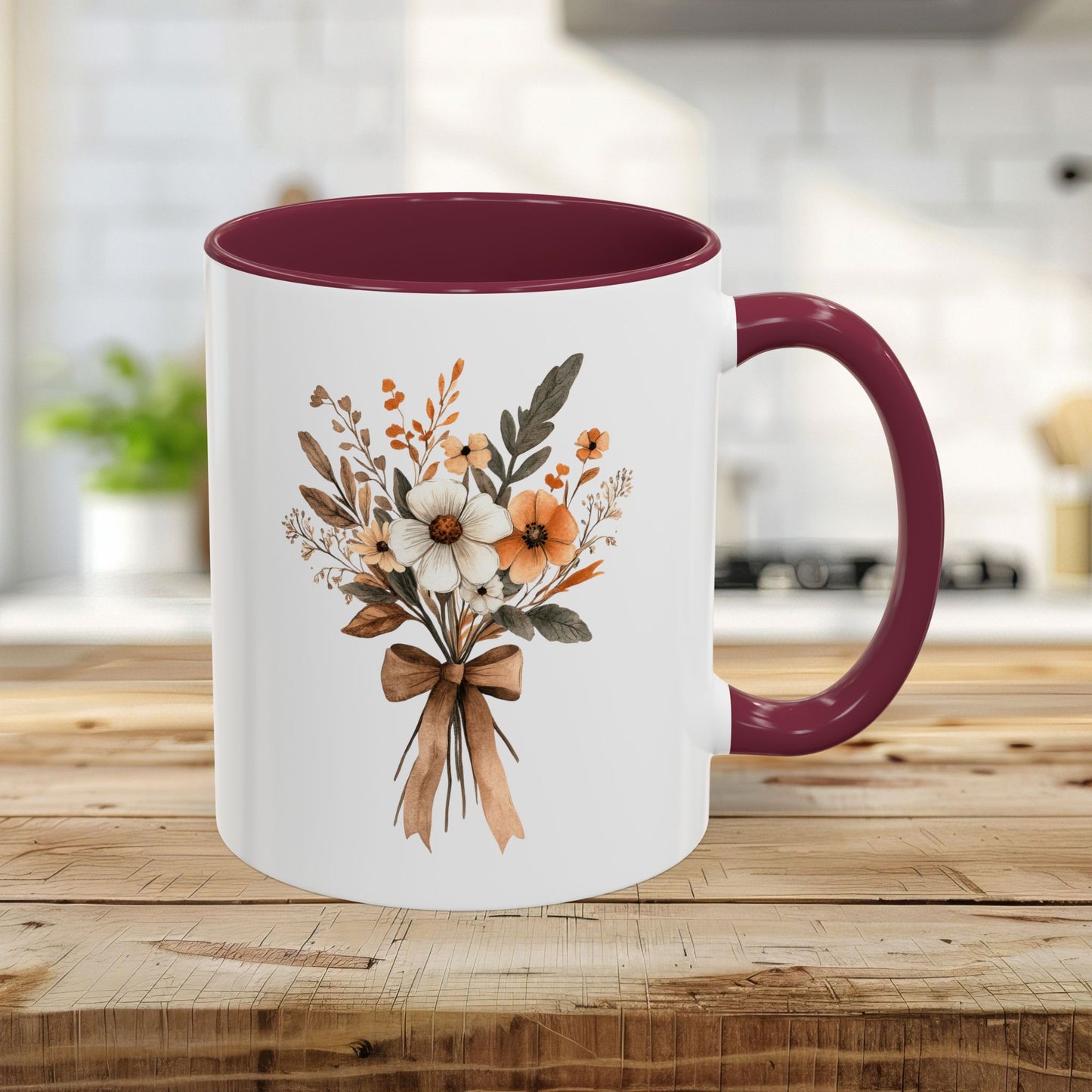 White 11oz ceramic mug with maroon interior and handle, featuring a sepia and cream floral bouquet.