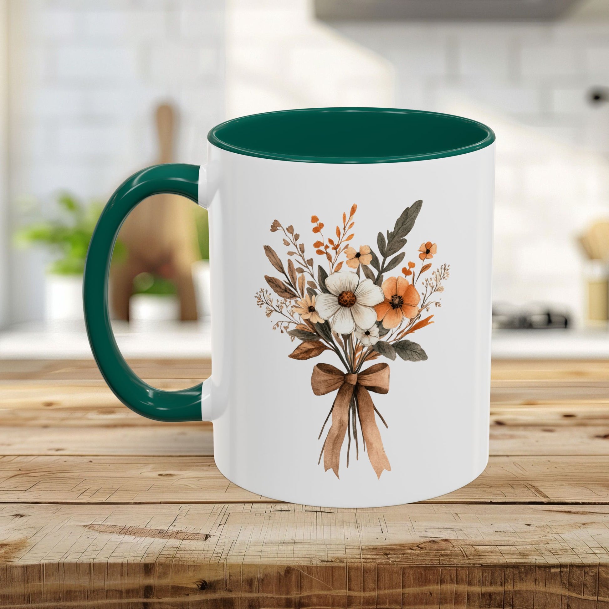 White ceramic mug with a dark green handle and interior, featuring a sepia and cream floral bouquet design.