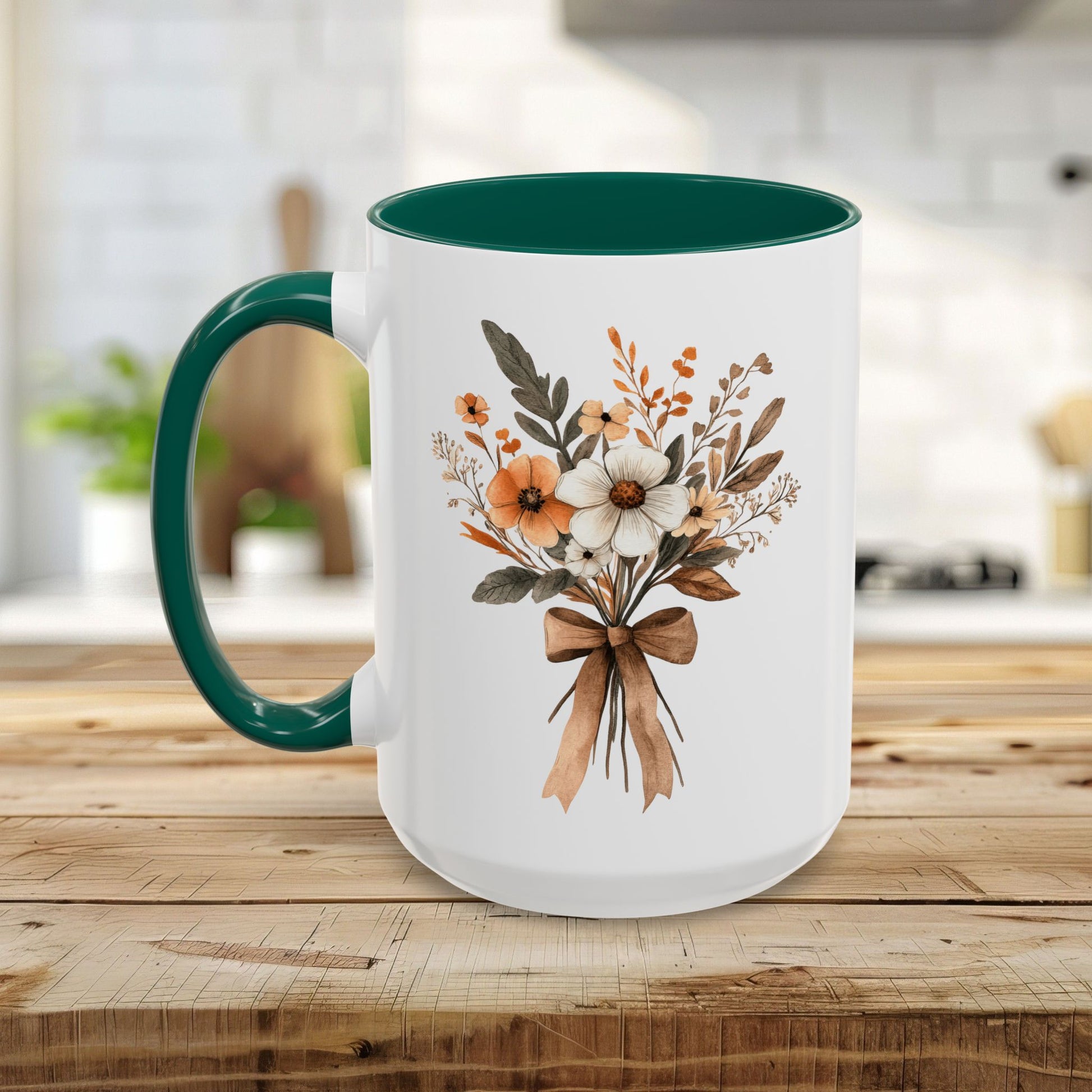 White ceramic mug with a green interior and handle, featuring a sepia and cream floral bouquet design.