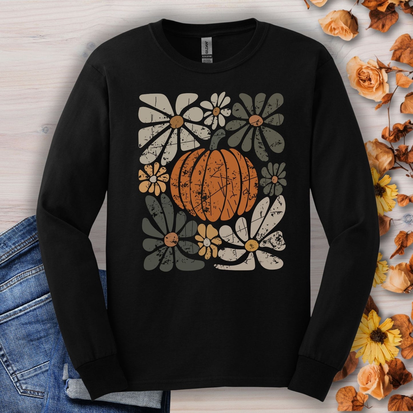 Black Gildan 2400 long sleeve tee with a rustic orange pumpkin and muted floral design.
