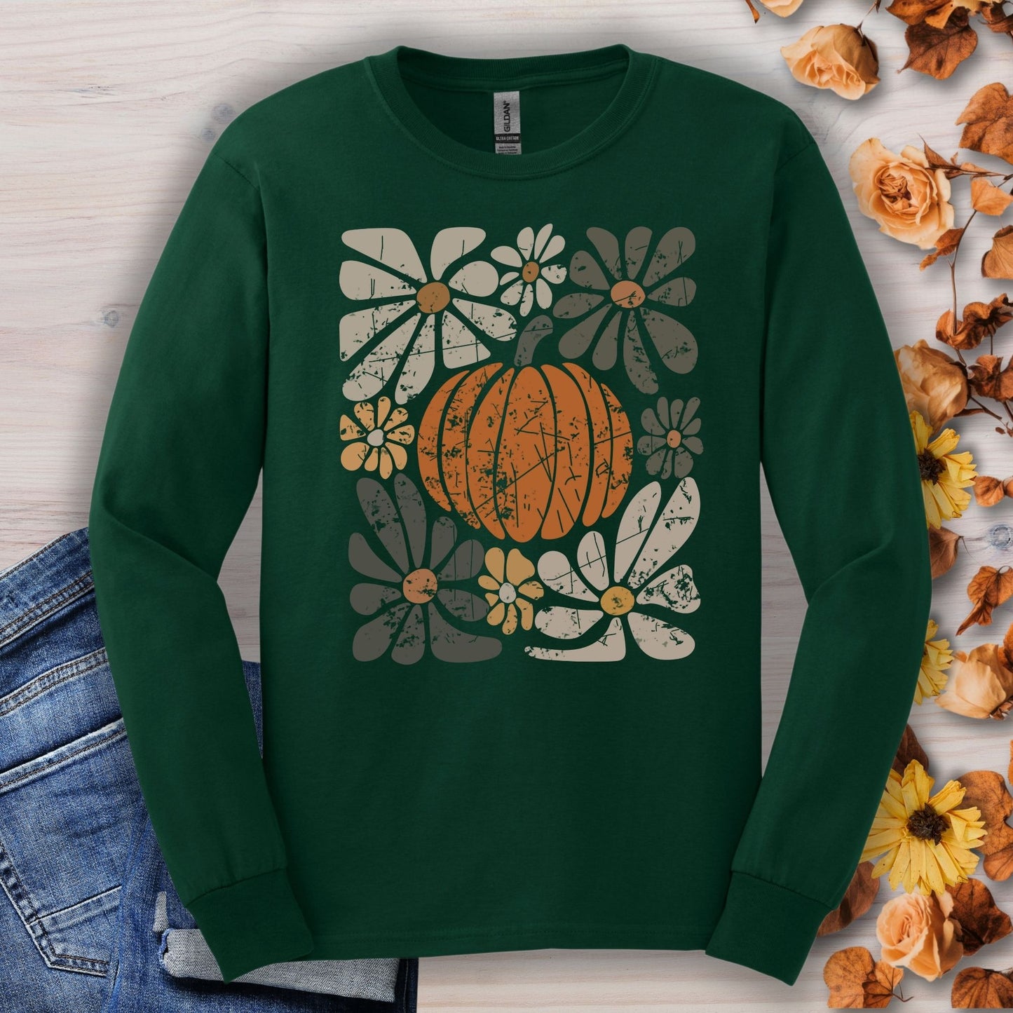 Forest Green Gildan long sleeve tee with a rustic pumpkin and floral design.