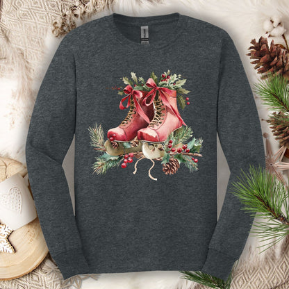 Dark Heather S long sleeve tee with watercolor red ice skates, holly, and evergreens.