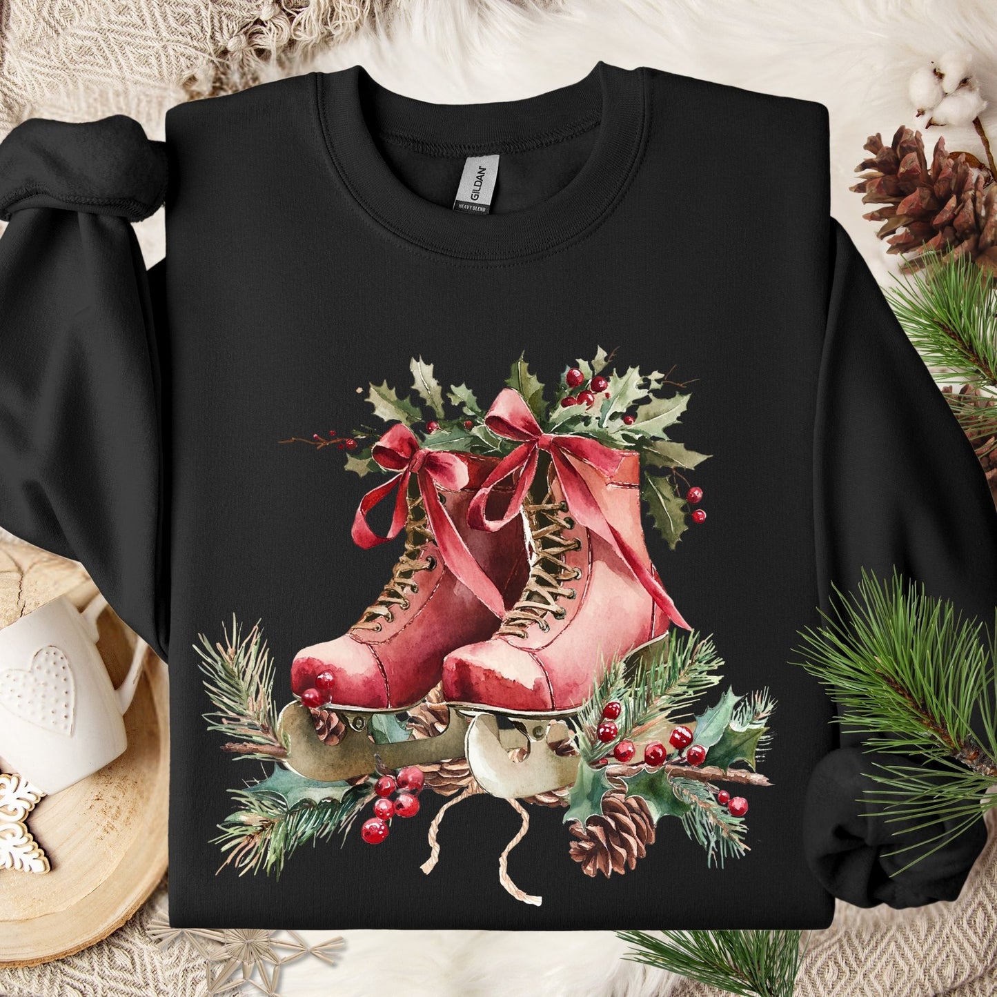 Black fleece sweatshirt with watercolor rustic red ice skates, holly berries, and winter greenery.