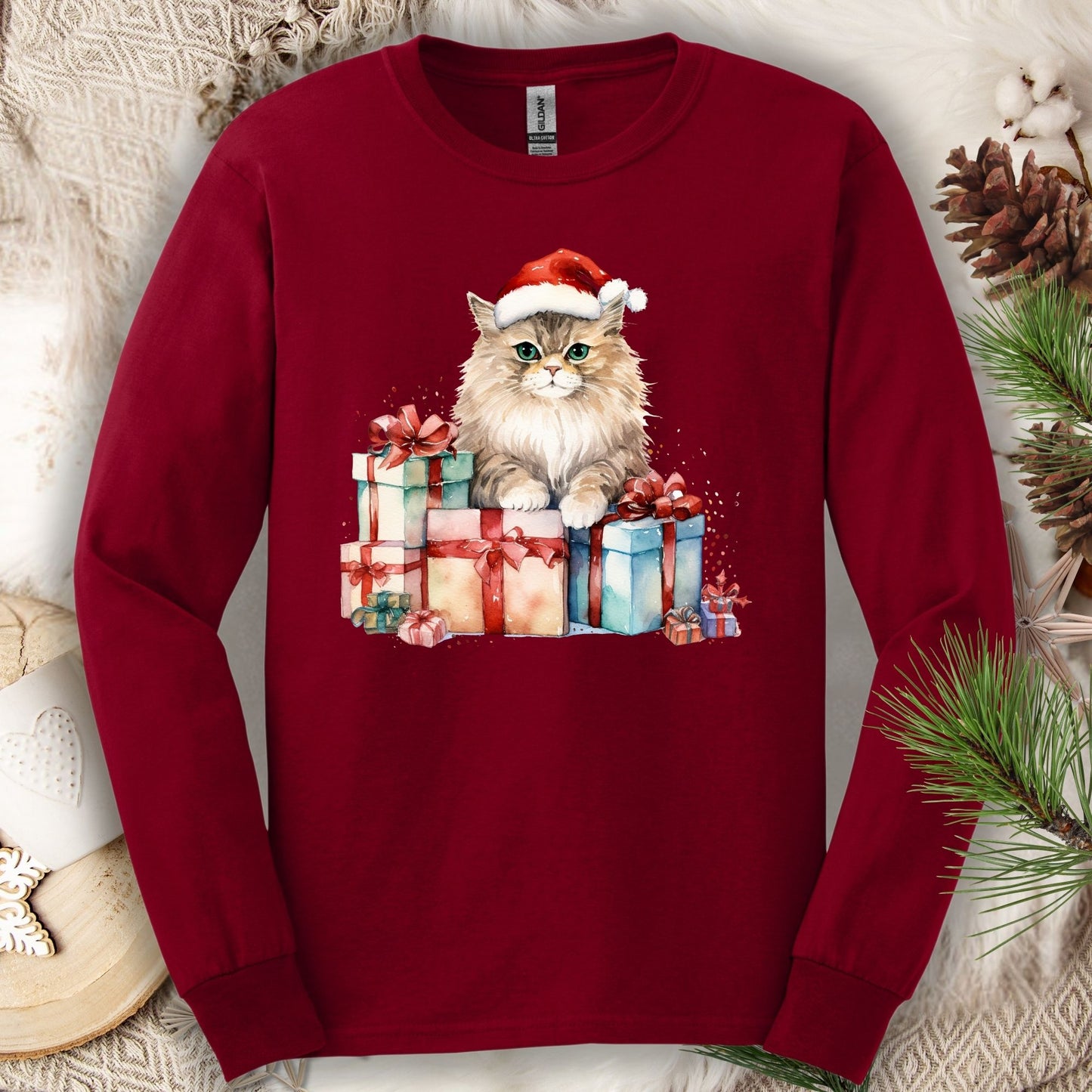 Cardinal Red Gildan long sleeve tee with a watercolor Santa cat and Christmas gifts.