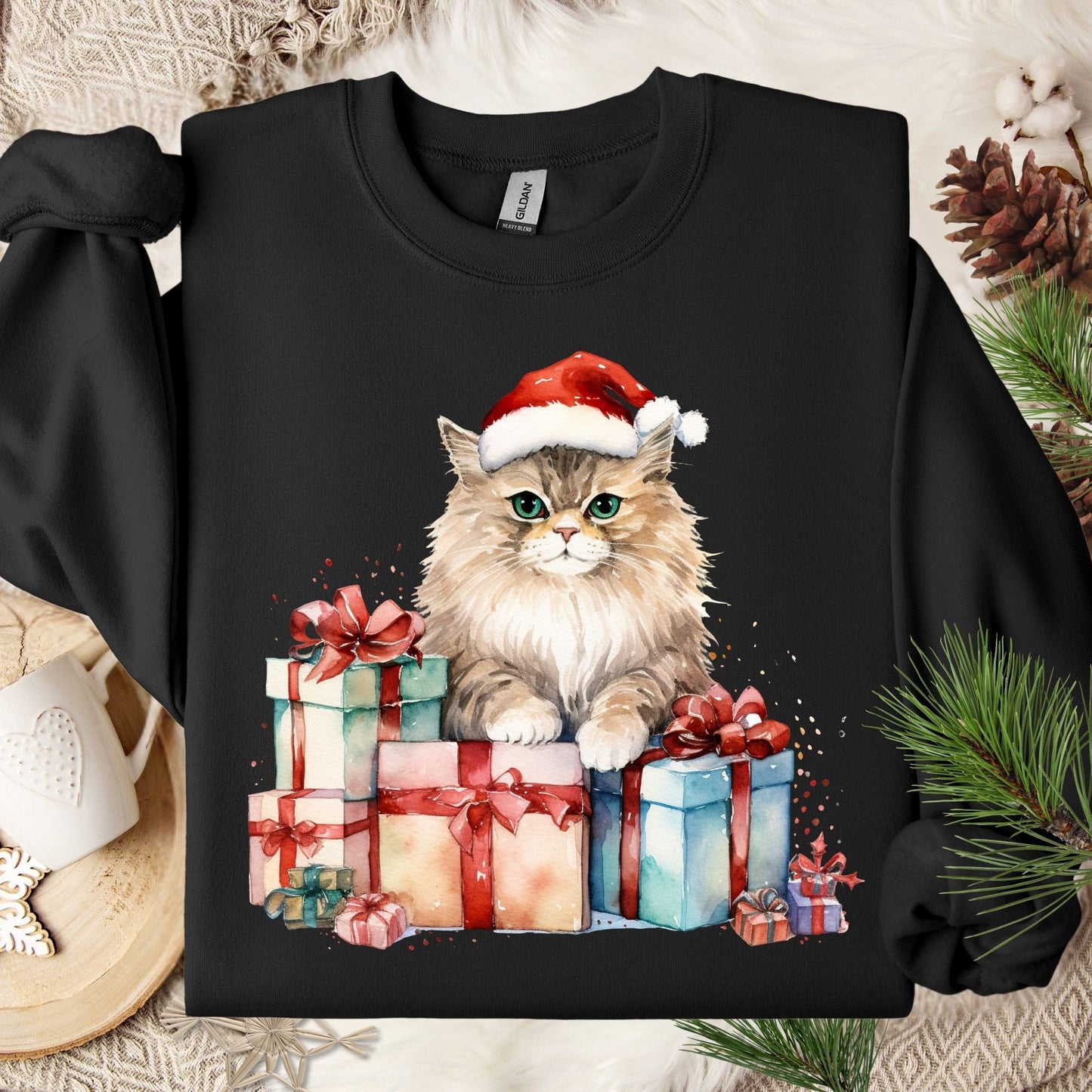 Black Gildan sweatshirt with a watercolor cat in a Santa hat on colorful Christmas presents.