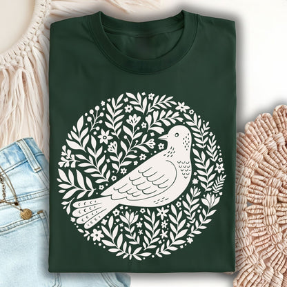 Forest Green S-size t-shirt with a white Scandinavian bird and floral wreath design.