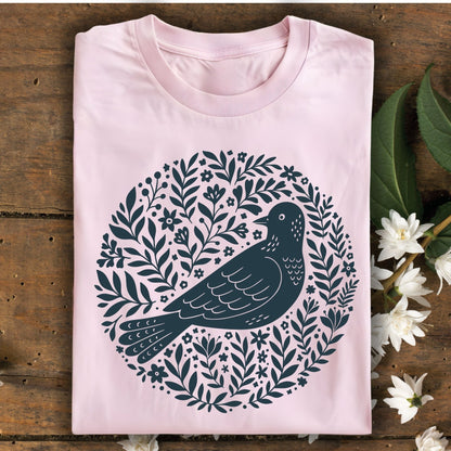 Light pink S-size t-shirt with a dark blue Scandinavian bird and floral design.