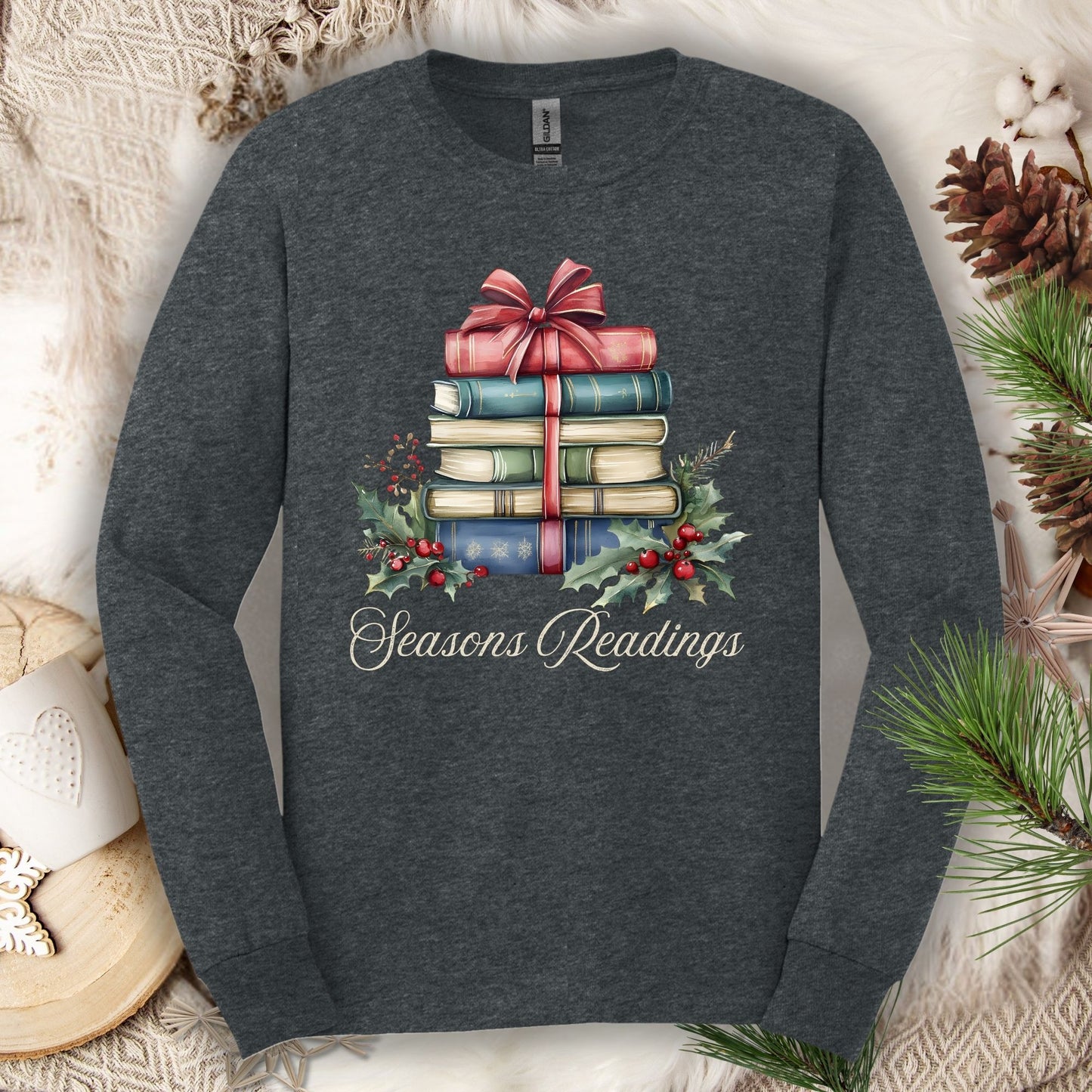 Dark Heather long sleeve tee with watercolor stack of vintage Christmas books, holly, and "Seasons Readings" text.