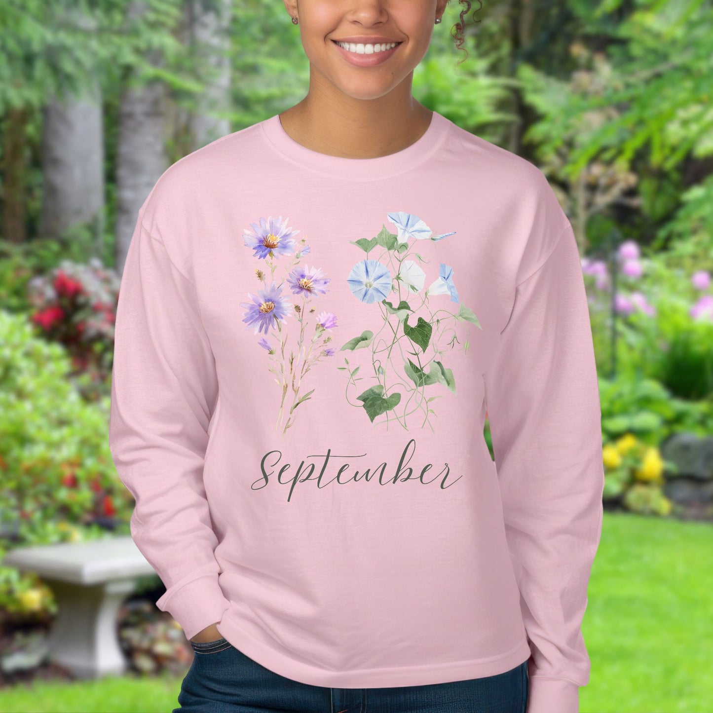 Pink long-sleeve tee with watercolor asters, morning glories, and "September" script.