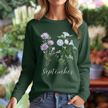 Dark green long sleeve tee with watercolor asters, morning glories, and "September" script.