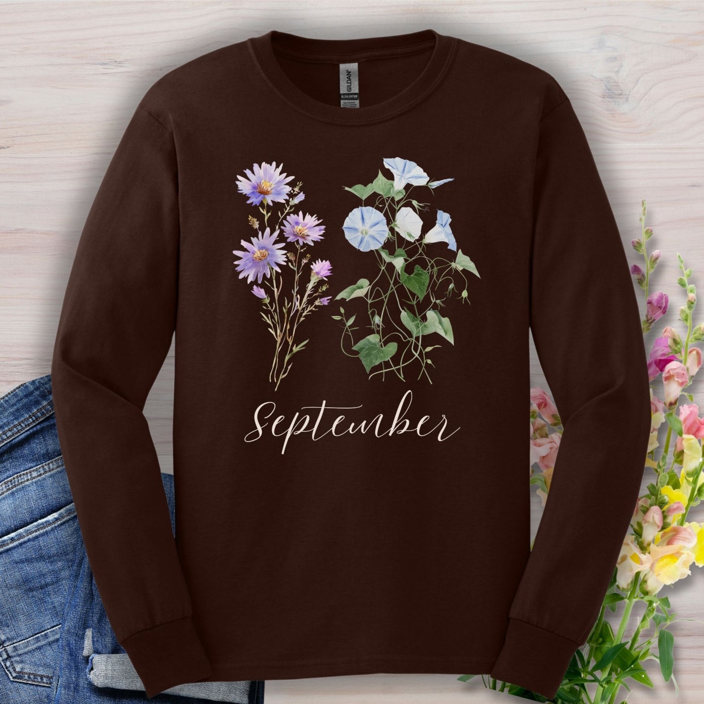 Dark chocolate long sleeve tee with watercolor aster and morning glory flowers, plus "September" script.
