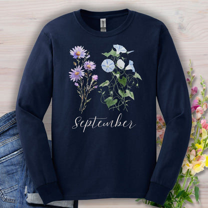Navy long-sleeve tee with watercolor asters, morning glories, and "September" script.