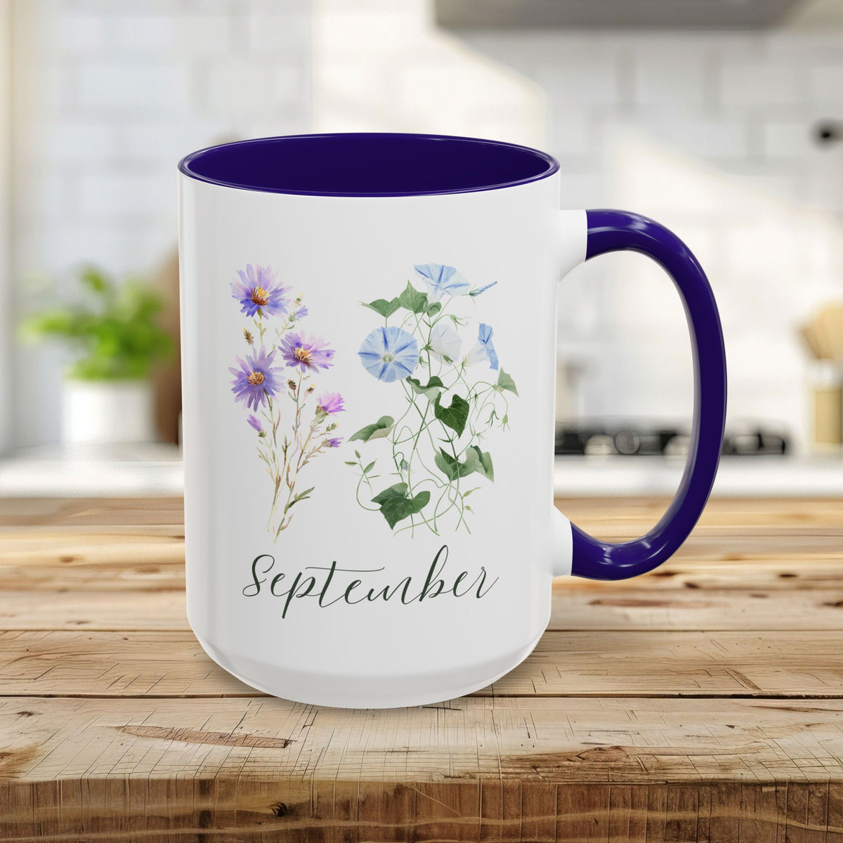 15oz ceramic mug with purple asters, blue morning glories, "September" text, and a blue handle/interior.